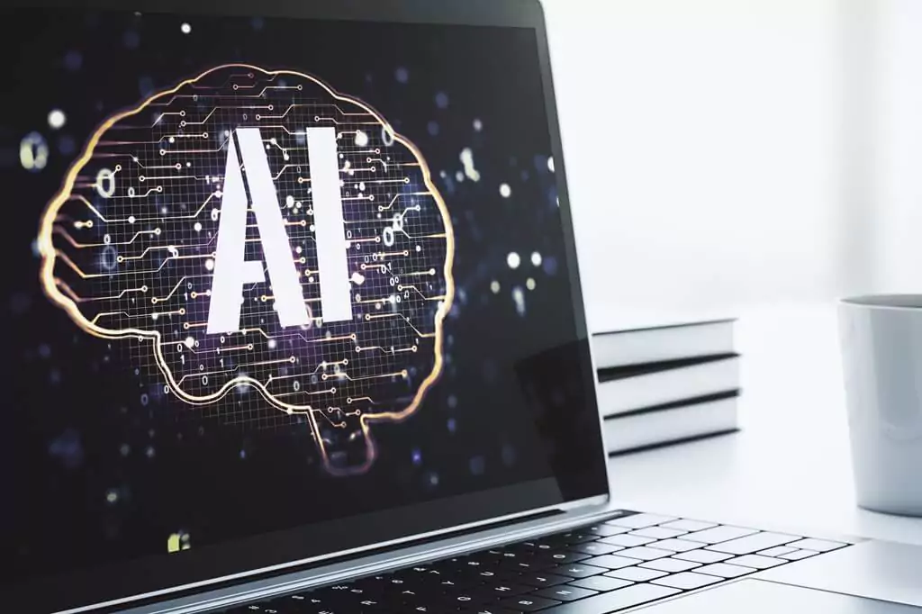 laptop com símbolo de IA e cérebro